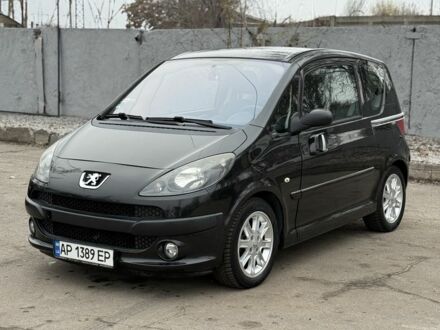 Черный Пежо 1007, объемом двигателя 1.4 л и пробегом 200 тыс. км за 3600 $, фото 1 на Automoto.ua