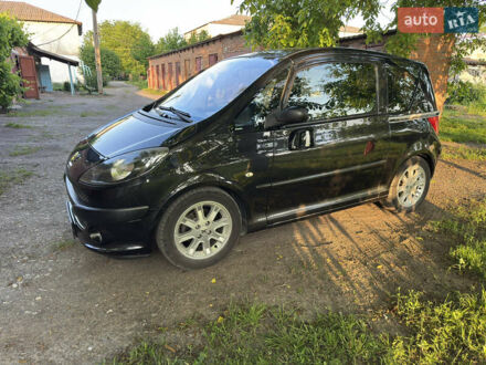 Черный Пежо 1007, объемом двигателя 1.59 л и пробегом 147 тыс. км за 4800 $, фото 1 на Automoto.ua