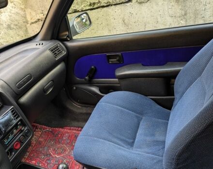 Белый Пежо 106, объемом двигателя 1 л и пробегом 290 тыс. км за 1350 $, фото 5 на Automoto.ua