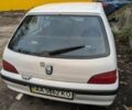 Белый Пежо 106, объемом двигателя 1 л и пробегом 290 тыс. км за 1350 $, фото 3 на Automoto.ua