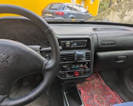 Белый Пежо 106, объемом двигателя 1 л и пробегом 290 тыс. км за 1350 $, фото 4 на Automoto.ua