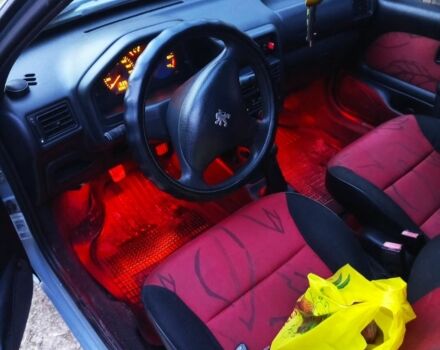 Серый Пежо 106, объемом двигателя 1 л и пробегом 300 тыс. км за 2300 $, фото 3 на Automoto.ua