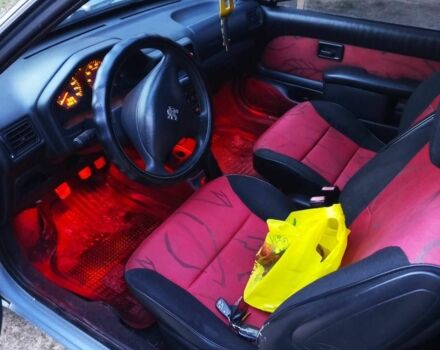 Серый Пежо 106, объемом двигателя 1 л и пробегом 300 тыс. км за 2300 $, фото 4 на Automoto.ua
