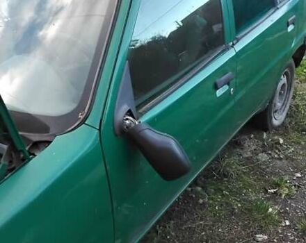 Зеленый Пежо 106, объемом двигателя 1.1 л и пробегом 317 тыс. км за 1200 $, фото 4 на Automoto.ua