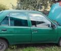 Зеленый Пежо 106, объемом двигателя 1.1 л и пробегом 317 тыс. км за 1200 $, фото 7 на Automoto.ua