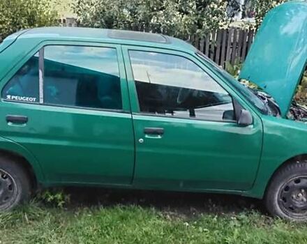 Зеленый Пежо 106, объемом двигателя 1.1 л и пробегом 317 тыс. км за 1200 $, фото 6 на Automoto.ua