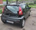 Черный Пежо 107, объемом двигателя 1 л и пробегом 250 тыс. км за 4300 $, фото 1 на Automoto.ua