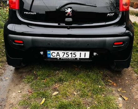 Черный Пежо 107, объемом двигателя 1 л и пробегом 131 тыс. км за 5800 $, фото 1 на Automoto.ua