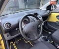 Желтый Пежо 107, объемом двигателя 1 л и пробегом 178 тыс. км за 3500 $, фото 22 на Automoto.ua
