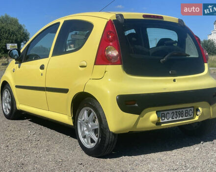 Желтый Пежо 107, объемом двигателя 1 л и пробегом 261 тыс. км за 3900 $, фото 2 на Automoto.ua