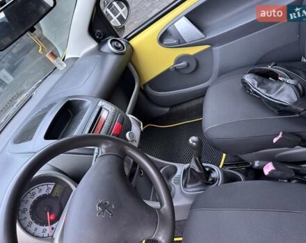 Желтый Пежо 107, объемом двигателя 1 л и пробегом 178 тыс. км за 3500 $, фото 21 на Automoto.ua