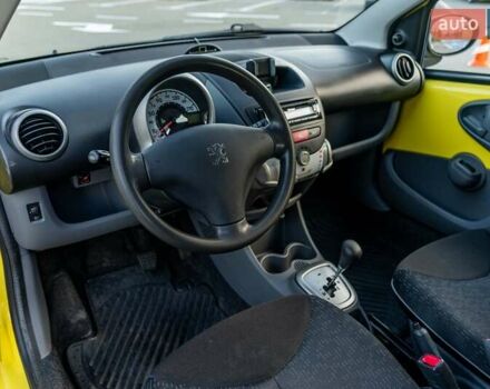 Желтый Пежо 107, объемом двигателя 1 л и пробегом 169 тыс. км за 4500 $, фото 26 на Automoto.ua