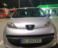Серый Пежо 107, объемом двигателя 1 л и пробегом 154 тыс. км за 3299 $, фото 1 на Automoto.ua