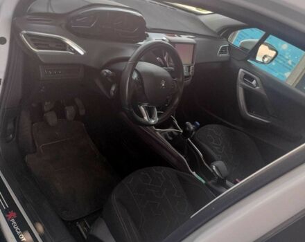 Белый Пежо 2008, объемом двигателя 1.2 л и пробегом 130 тыс. км за 6967 $, фото 6 на Automoto.ua