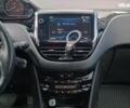Белый Пежо 2008, объемом двигателя 1.2 л и пробегом 79 тыс. км за 11990 $, фото 15 на Automoto.ua
