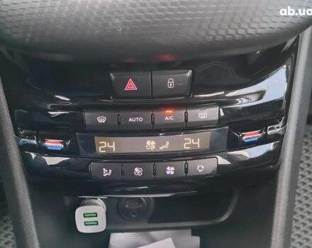 Белый Пежо 2008, объемом двигателя 1.2 л и пробегом 79 тыс. км за 11990 $, фото 26 на Automoto.ua