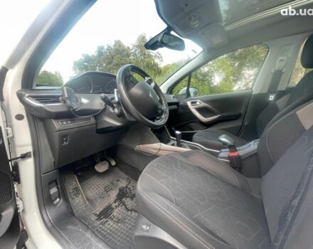 Пежо 2008 2013 у Києві на Automoto.ua Білий Пежо 2008, об'ємом двигуна 1.2 л та пробігом 171 тис. км за 8390 $, фото 21 на Automoto.ua