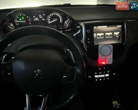 Білий Пежо 2008, об'ємом двигуна 1.2 л та пробігом 118 тис. км за 9000 $, фото 21 на Automoto.ua