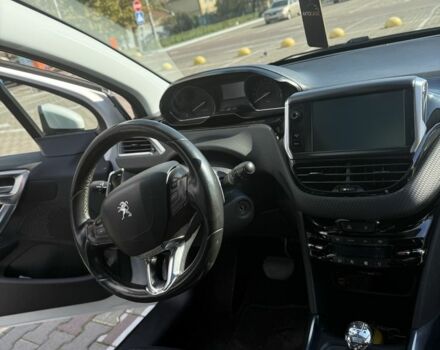 Белый Пежо 2008, объемом двигателя 1.2 л и пробегом 174 тыс. км за 6900 $, фото 21 на Automoto.ua