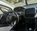Белый Пежо 2008, объемом двигателя 1.2 л и пробегом 174 тыс. км за 6900 $, фото 21 на Automoto.ua