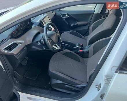 Білий Пежо 2008, об'ємом двигуна 1.2 л та пробігом 118 тис. км за 9000 $, фото 11 на Automoto.ua