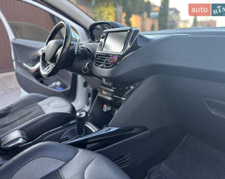 Белый Пежо 2008, объемом двигателя 1.56 л и пробегом 234 тыс. км за 11000 $, фото 26 на Automoto.ua