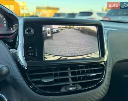 Пежо 2008 2015 в Киеве на Automoto.ua Белый Пежо 2008, объемом двигателя 1.6 л и пробегом 52 тыс. км за 12100 $, фото 12 на Automoto.ua