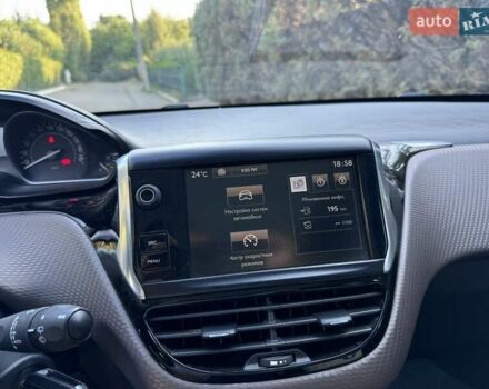 Белый Пежо 2008, объемом двигателя 1.2 л и пробегом 89 тыс. км за 10300 $, фото 18 на Automoto.ua