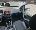 Белый Пежо 2008, объемом двигателя 1.2 л и пробегом 73 тыс. км за 11500 $, фото 23 на Automoto.ua