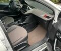 Білий Пежо 2008, об'ємом двигуна 1.2 л та пробігом 177 тис. км за 8750 $, фото 4 на Automoto.ua