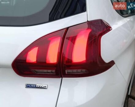 Белый Пежо 2008, объемом двигателя 1.2 л и пробегом 79 тыс. км за 11990 $, фото 7 на Automoto.ua