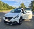Білий Пежо 2008, об'ємом двигуна 1.2 л та пробігом 128 тис. км за 12999 $, фото 1 на Automoto.ua