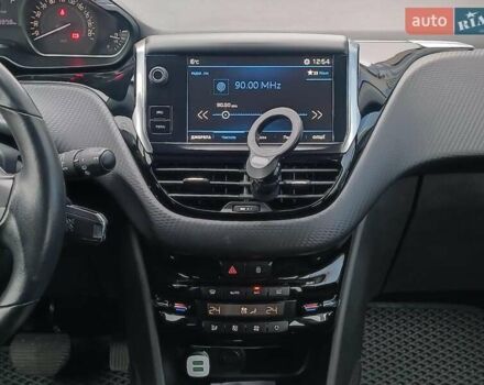 Белый Пежо 2008, объемом двигателя 1.2 л и пробегом 79 тыс. км за 11990 $, фото 17 на Automoto.ua