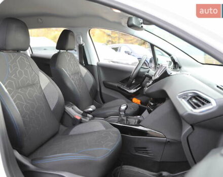 Белый Пежо 2008, объемом двигателя 1.2 л и пробегом 69 тыс. км за 11500 $, фото 9 на Automoto.ua