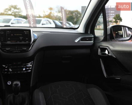 Белый Пежо 2008, объемом двигателя 1.2 л и пробегом 69 тыс. км за 11500 $, фото 12 на Automoto.ua