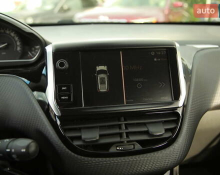 Белый Пежо 2008, объемом двигателя 1.2 л и пробегом 69 тыс. км за 11500 $, фото 15 на Automoto.ua