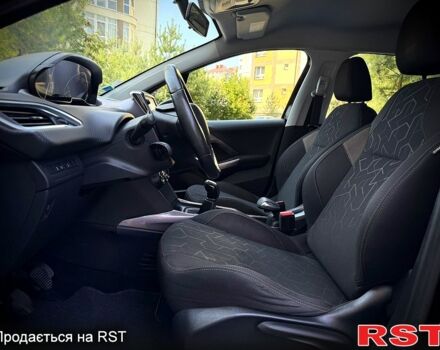 Чорний Пежо 2008, об'ємом двигуна 1.6 л та пробігом 220 тис. км за 9199 $, фото 4 на Automoto.ua