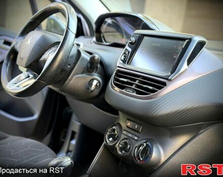 Чорний Пежо 2008, об'ємом двигуна 1.6 л та пробігом 220 тис. км за 9199 $, фото 5 на Automoto.ua