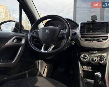 Пежо 2008 2013 у Києві на Automoto.ua Коричневий Пежо 2008, об'ємом двигуна 1.2 л та пробігом 130 тис. км за 8990 $, фото 13 на Automoto.ua