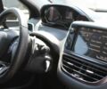 Коричневый Пежо 2008, объемом двигателя 1.2 л и пробегом 104 тыс. км за 7900 $, фото 15 на Automoto.ua