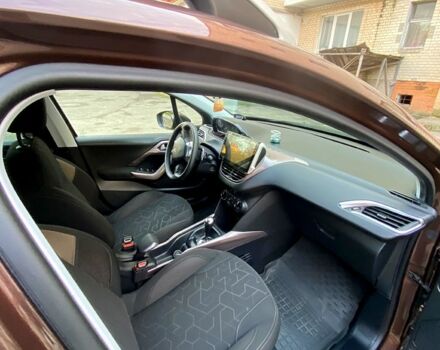 Пежо 2008 2014 в Хмельницком на Automoto.ua Коричневый Пежо 2008, объемом двигателя 1.2 л и пробегом 106 тыс. км за 9000 $, фото 5 на Automoto.ua