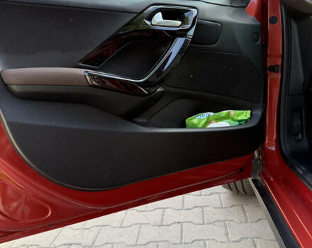 Красный Пежо 2008, объемом двигателя 1.2 л и пробегом 71 тыс. км за 9900 $, фото 26 на Automoto.ua