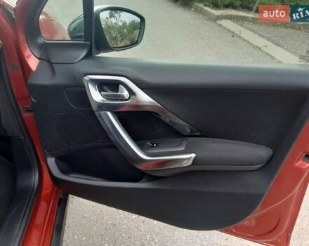Красный Пежо 2008, объемом двигателя 1.2 л и пробегом 49 тыс. км за 9000 $, фото 15 на Automoto.ua