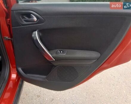 Красный Пежо 2008, объемом двигателя 1.2 л и пробегом 49 тыс. км за 9000 $, фото 14 на Automoto.ua