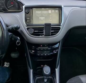 Червоний Пежо 2008, об'ємом двигуна 1.2 л та пробігом 124 тис. км за 12500 $, фото 4 на Automoto.ua