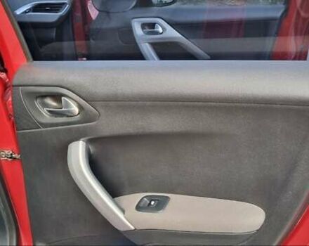 Червоний Пежо 2008, об'ємом двигуна 1.2 л та пробігом 124 тис. км за 12500 $, фото 6 на Automoto.ua