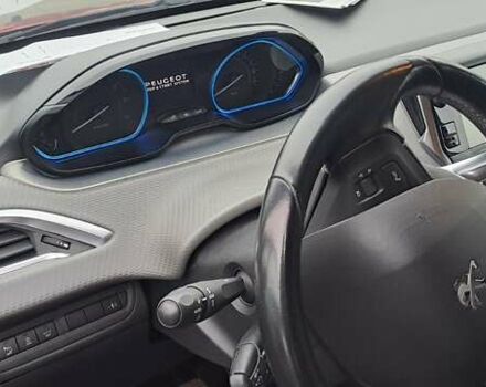 Красный Пежо 2008, объемом двигателя 1.2 л и пробегом 103 тыс. км за 9800 $, фото 6 на Automoto.ua