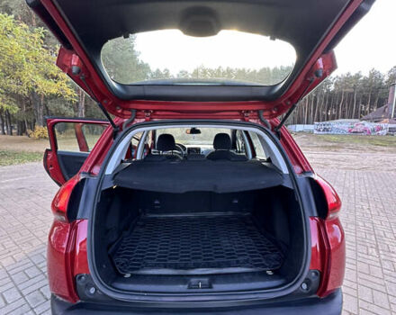 Червоний Пежо 2008, об'ємом двигуна 1.2 л та пробігом 159 тис. км за 10999 $, фото 4 на Automoto.ua