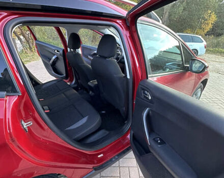 Червоний Пежо 2008, об'ємом двигуна 1.2 л та пробігом 159 тис. км за 10999 $, фото 3 на Automoto.ua