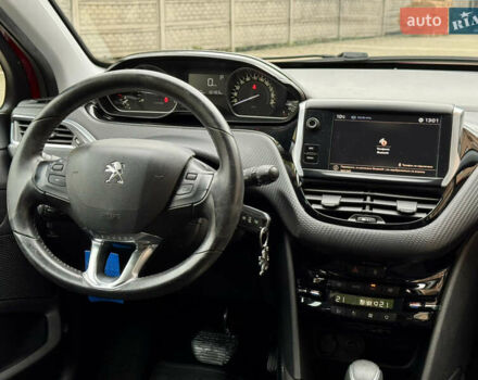Червоний Пежо 2008, об'ємом двигуна 1.2 л та пробігом 130 тис. км за 10800 $, фото 21 на Automoto.ua